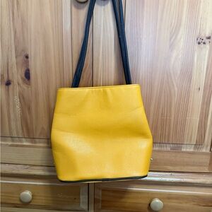 Elegant Yellow Shoulder Bag with Black Straps
